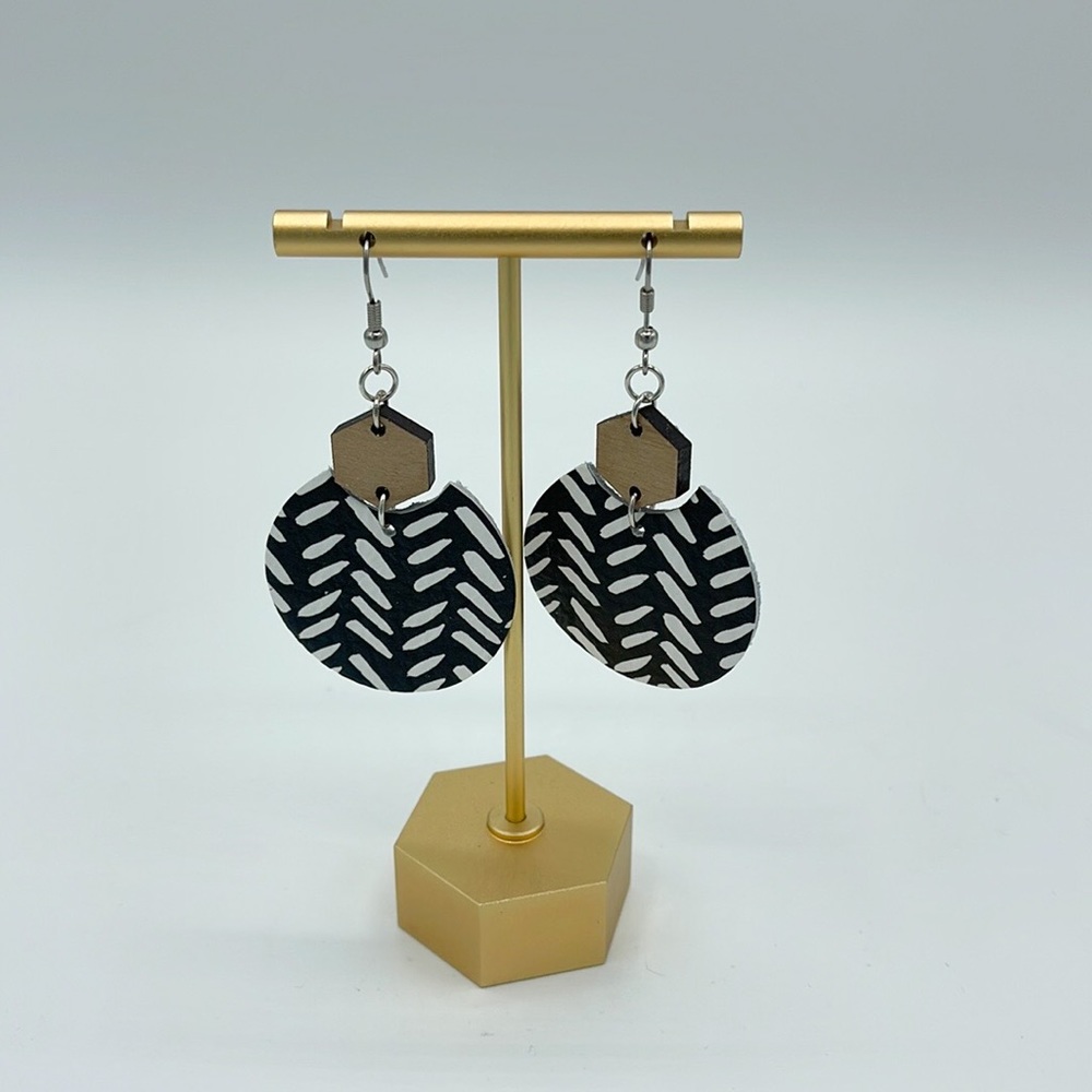 Black, white, and wood leather earrings